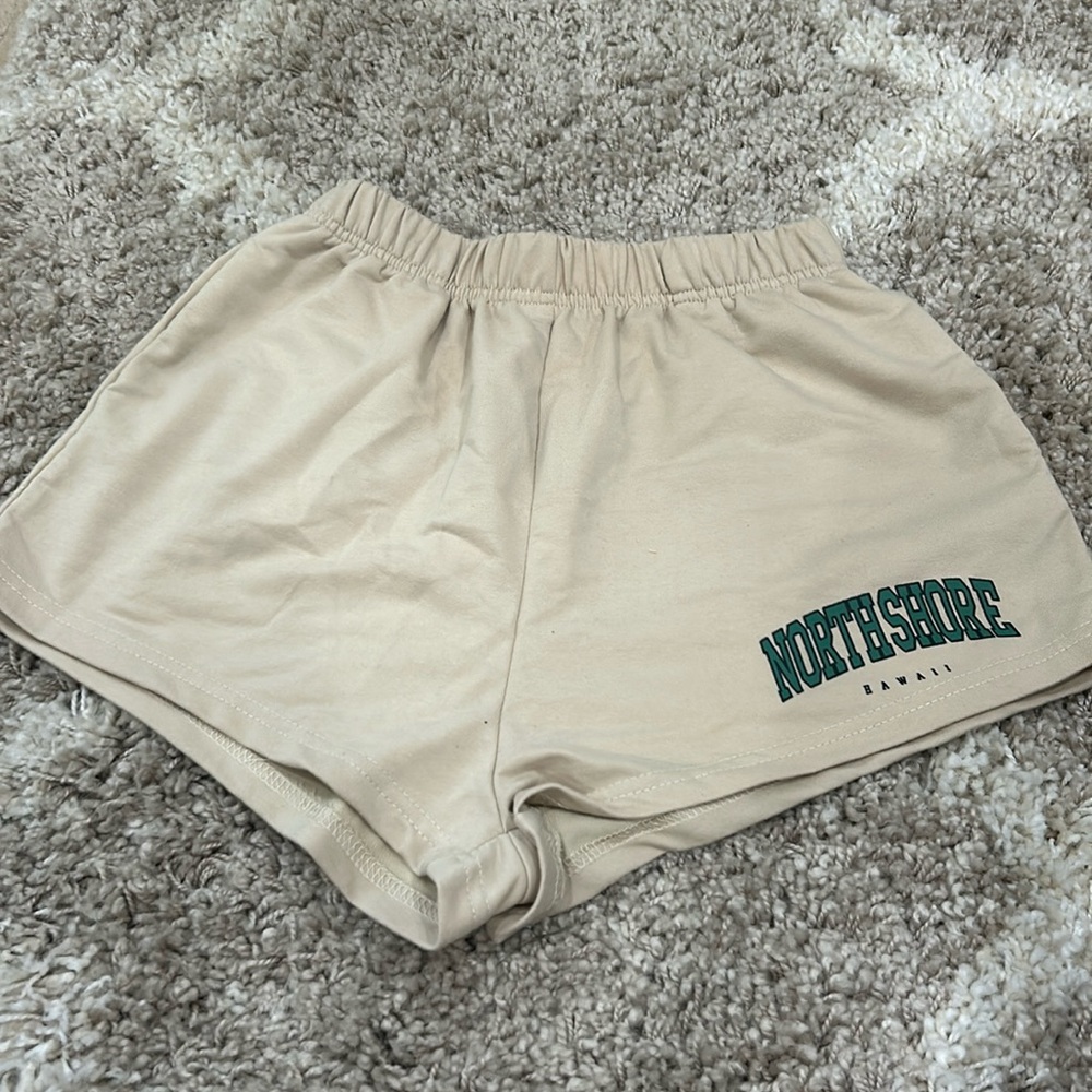 Tan with green writing comfy shorts from SHEIN